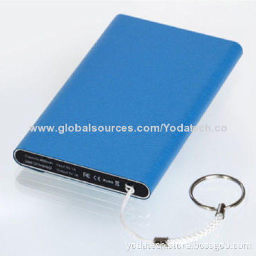 Power bank XCQ is ultra-thin, genuine leather appearance and has a mobile phone holster texture